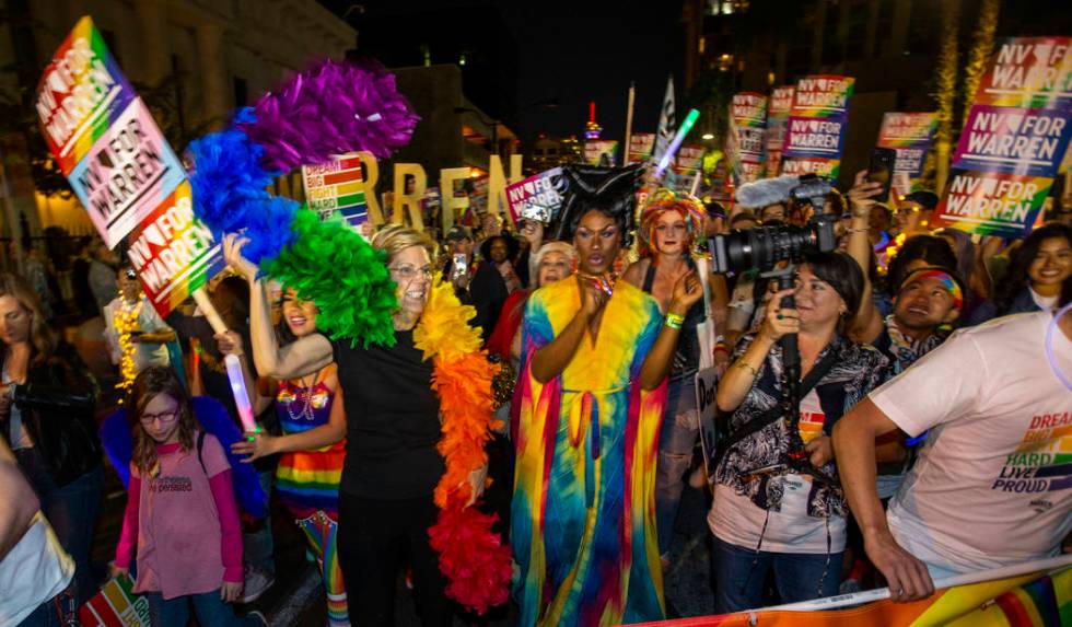 Democratic presidential candidate Sen. Elizabeth Warren, D-Mass., marching in the Pride parade ...