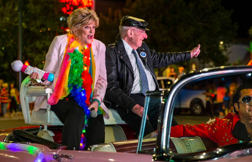 Mayor Carolyn Goodman and her husband, Oscar, ride up S. Fourth Street during the annual Las Ve ...