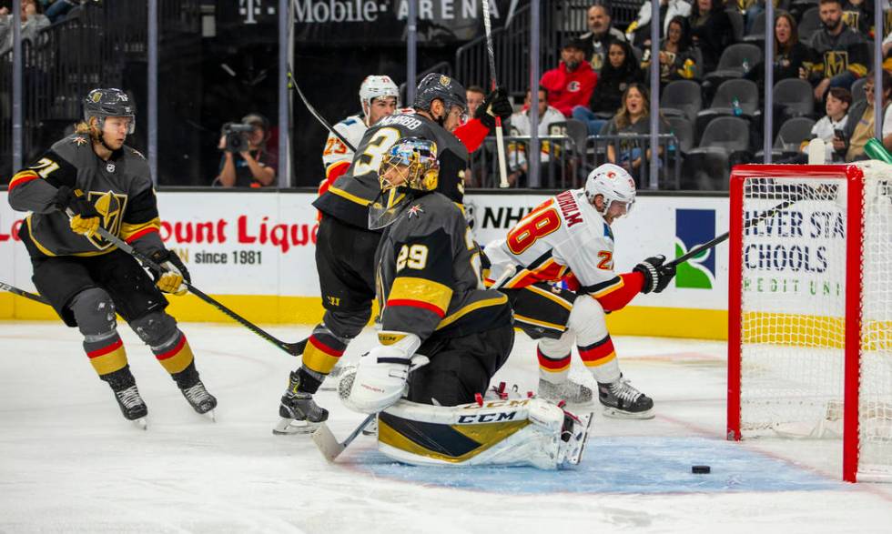 Vegas Golden Knights goaltender Marc-Andre Fleury (29) has a puck get past into the net by the ...