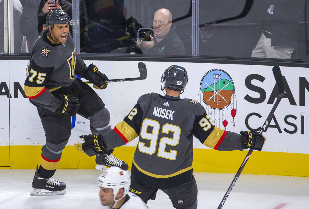 Vegas Golden Knights right wing Ryan Reaves (75) celebrates his first goal of the season with l ...