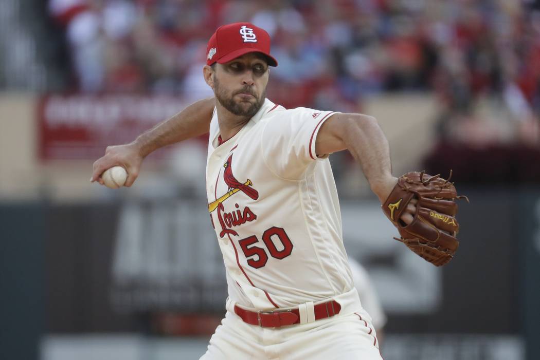 St. Louis Cardinals starting pitcher Adam Wainwright throws during the fourth inning of Game 2 ...