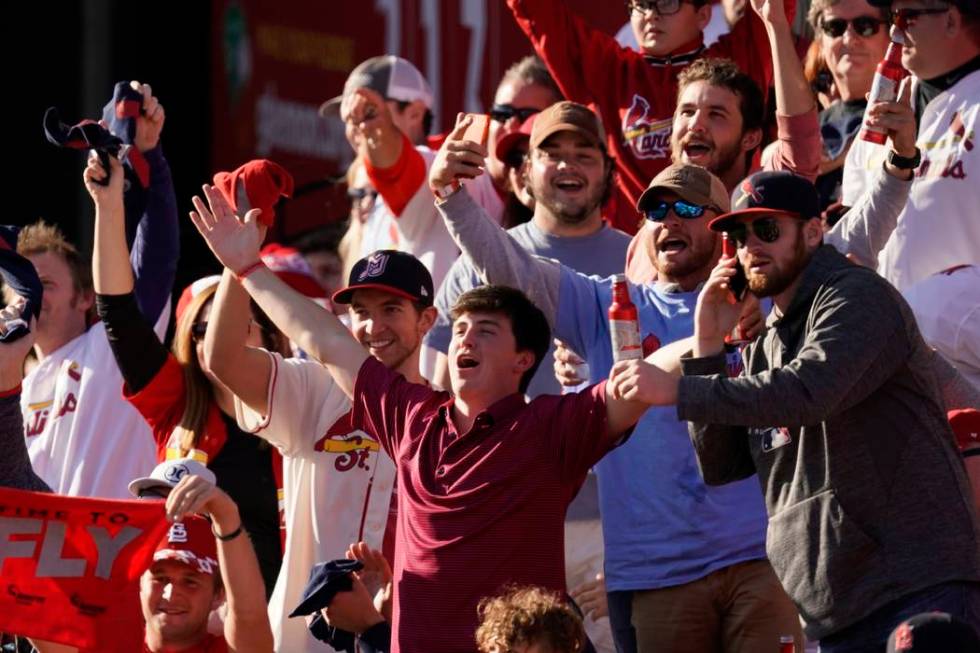 Fans cheer during the fifth inning of Game 2 of the baseball National League Championship Serie ...