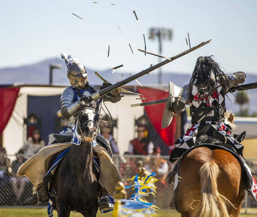 Lances shatter as Sir Jeffrey the Blue Knight, left, and Sir Anthony the Black Knight connect d ...