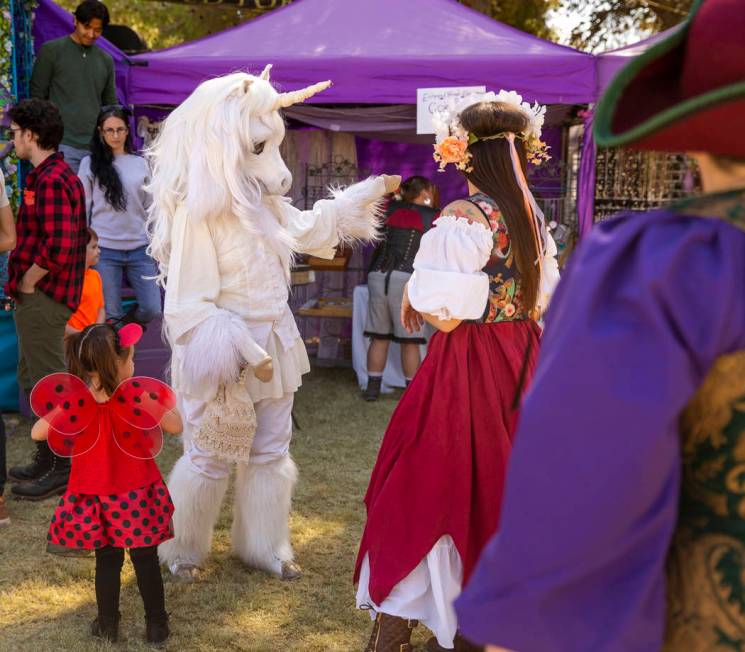 A standing horse directs attendees to the Enchanted Forest during the Age of Chivalry Renaissan ...