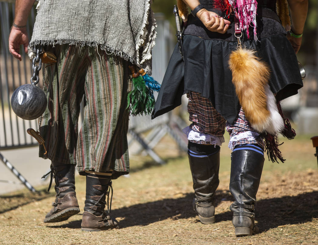 Participants dress in their best pirate wear during the Age of Chivalry Renaissance Festival at ...