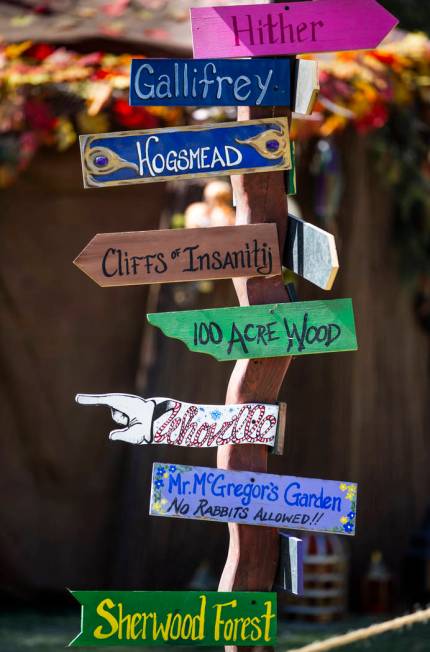 A signpost with location markers in the Greenwood Revelers encampment during the Age of Chivalr ...
