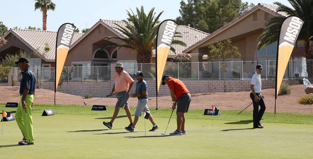 Players compete during the Major Series of Putting at Legacy Golf Club on Monday, Oct. 14, 2019 ...