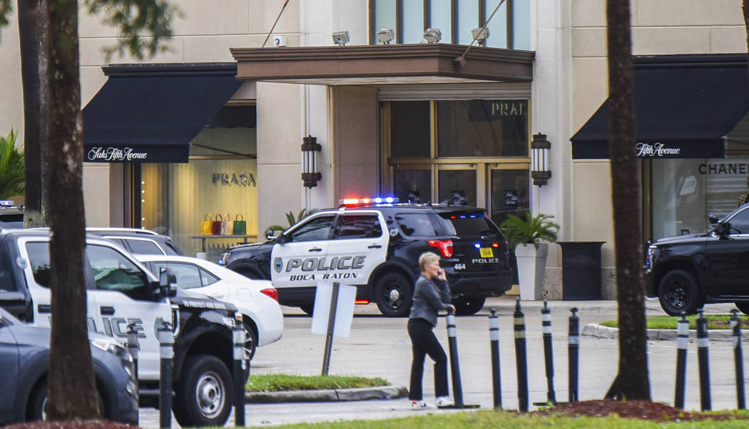 Authorities respond to Town Center at Boca Raton, Sunday, Oct. 13, 2019, in Boca Raton, Fla., a ...