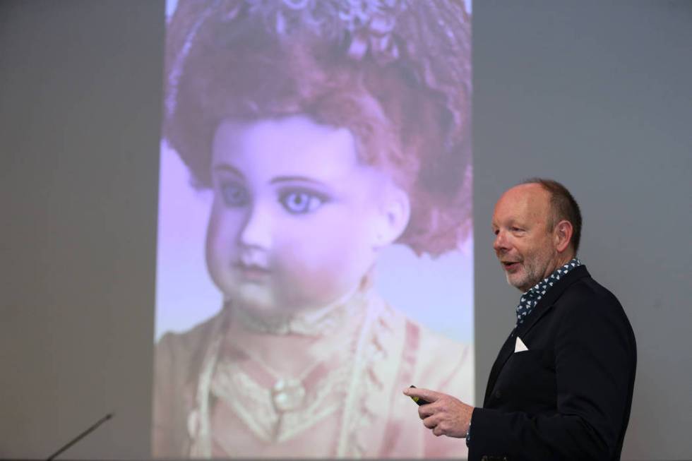 Stuart Holbrook, president of Theriault's, speaks during the Thirty Years a Doll Man event at t ...