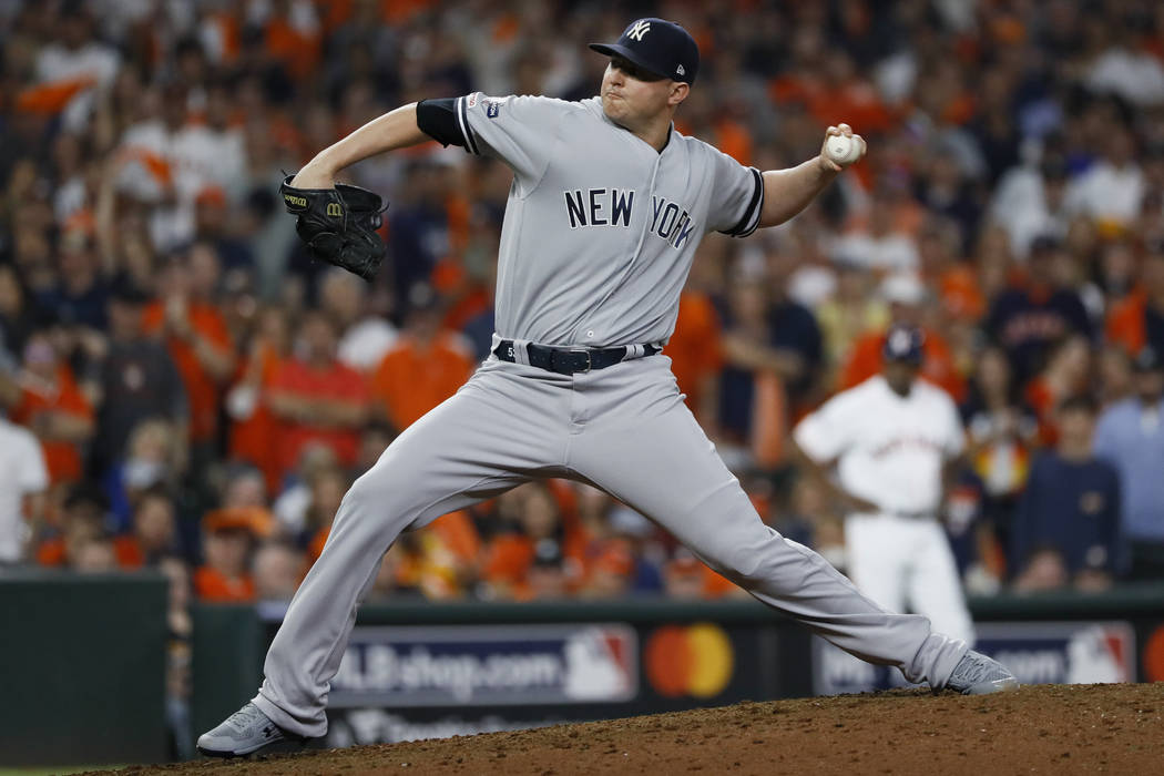 New York Yankees relief pitcher Zack Britton throws against the Houston Astros during the eight ...