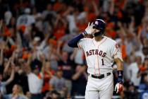 Houston Astros shortstop Carlos Correa celebrates after his walk-off home run against the New Y ...