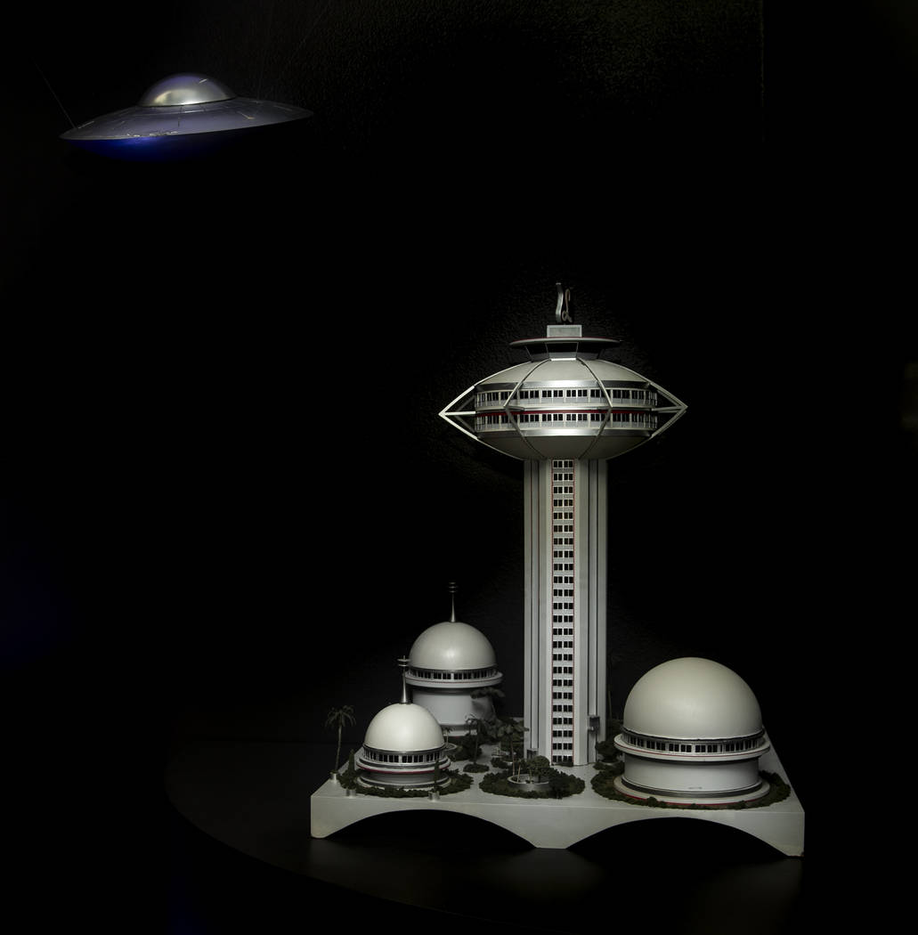 Art pieces "Space Saucer With Dents" at left and "Model for the LandMark Hotel a ...