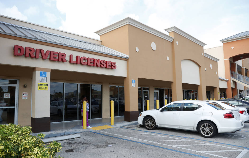 A Florida Highway Safety and Motor Vehicles drivers license service center is shown, Tuesday, O ...