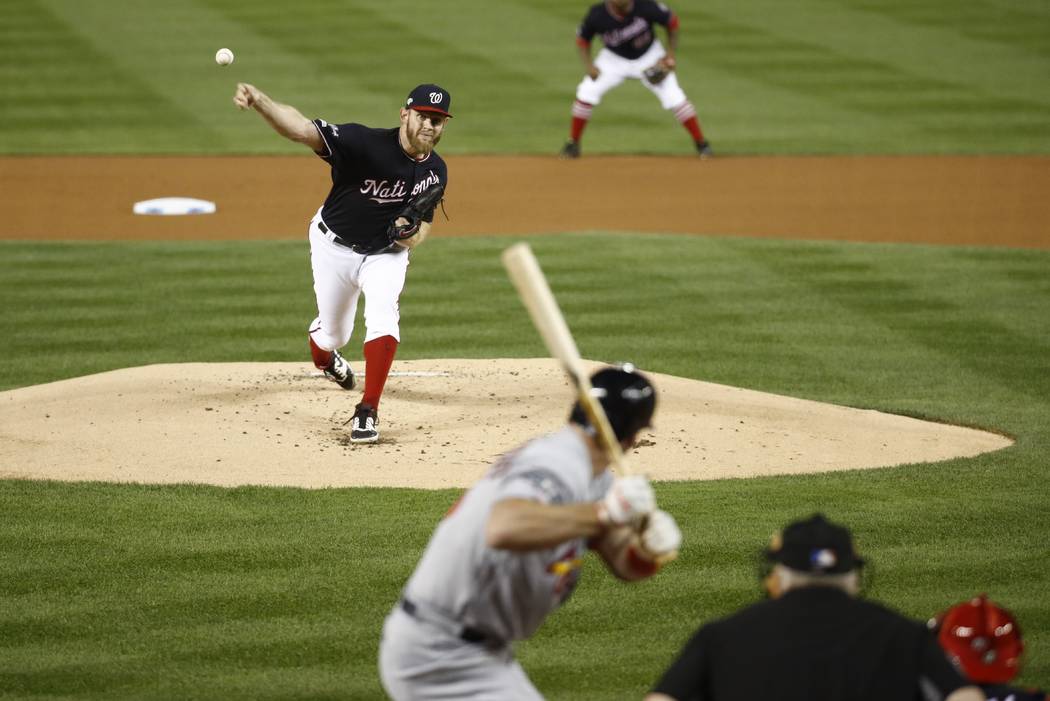 Washington Nationals starting pitcher Stephen Strasburg throws during the first inning of Game ...