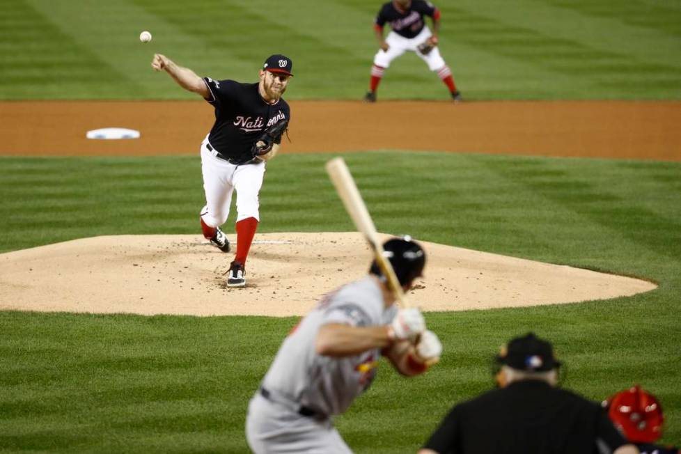 Washington Nationals starting pitcher Stephen Strasburg throws during the first inning of Game ...