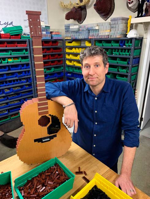 Lego artist Nathan Sawaya builds Phoebe’s guitar for his “Friends” set, which will be dis ...
