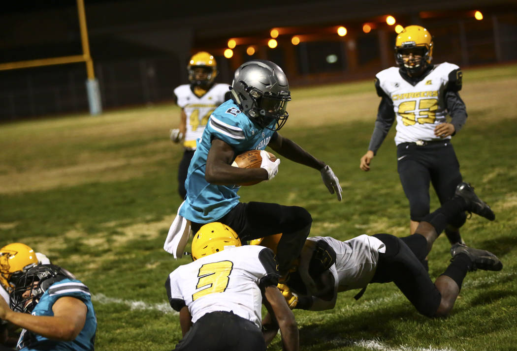 Silverado's Aginae Cunningham (2) is forced out of bounds by Clark during the second half of a ...