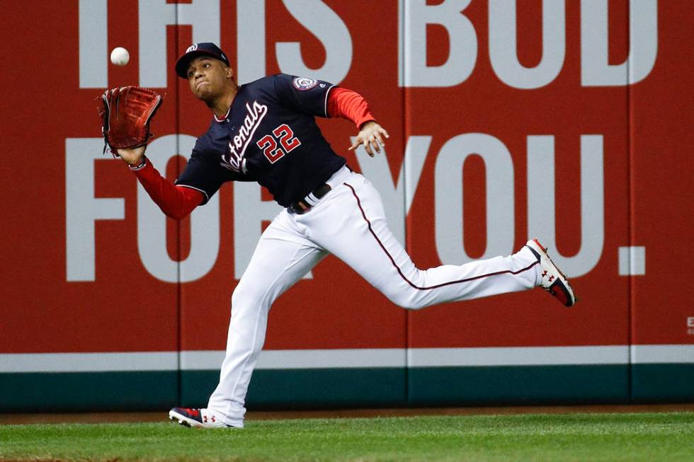 Washington Nationals' Juan Soto makes a running catch on a ball hit by St. Louis Cardinals' Kol ...