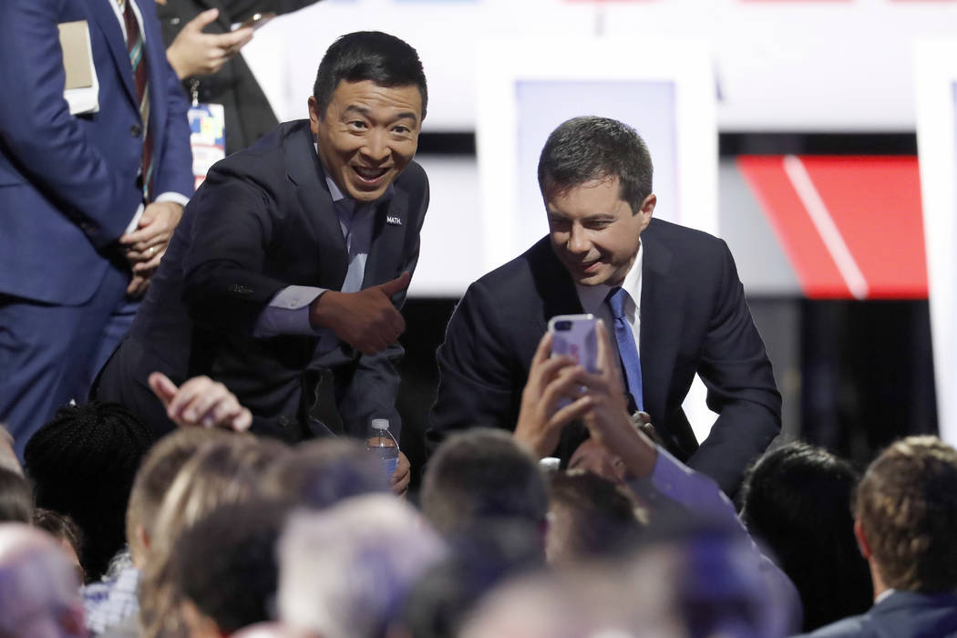 Democratic presidential candidate entrepreneur Andrew Yang and South Bend Mayor Pete Buttigieg, ...
