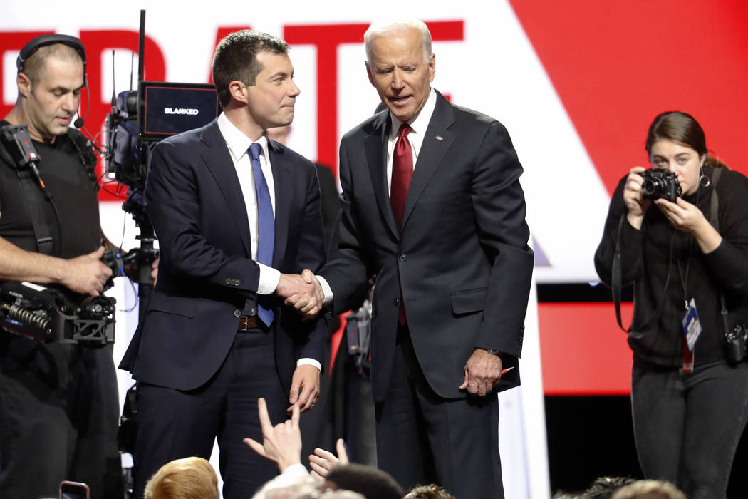 Democratic presidential candidate South Bend Mayor Pete Buttigieg, left, and former Vice Presid ...