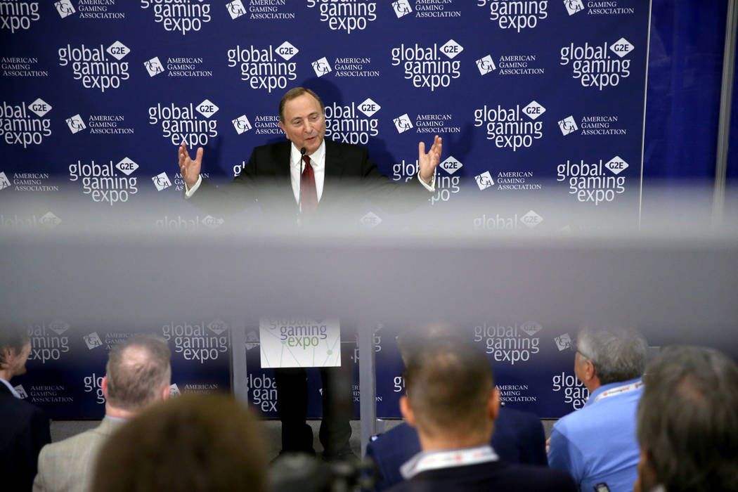 NHL commissioner Gary Bettman talks to the news media after a sports betting panel during the 2 ...