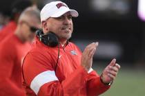 UNLV Head Coach Tony Sanchez encourages his team against Vanderbilt in the second half of an NC ...