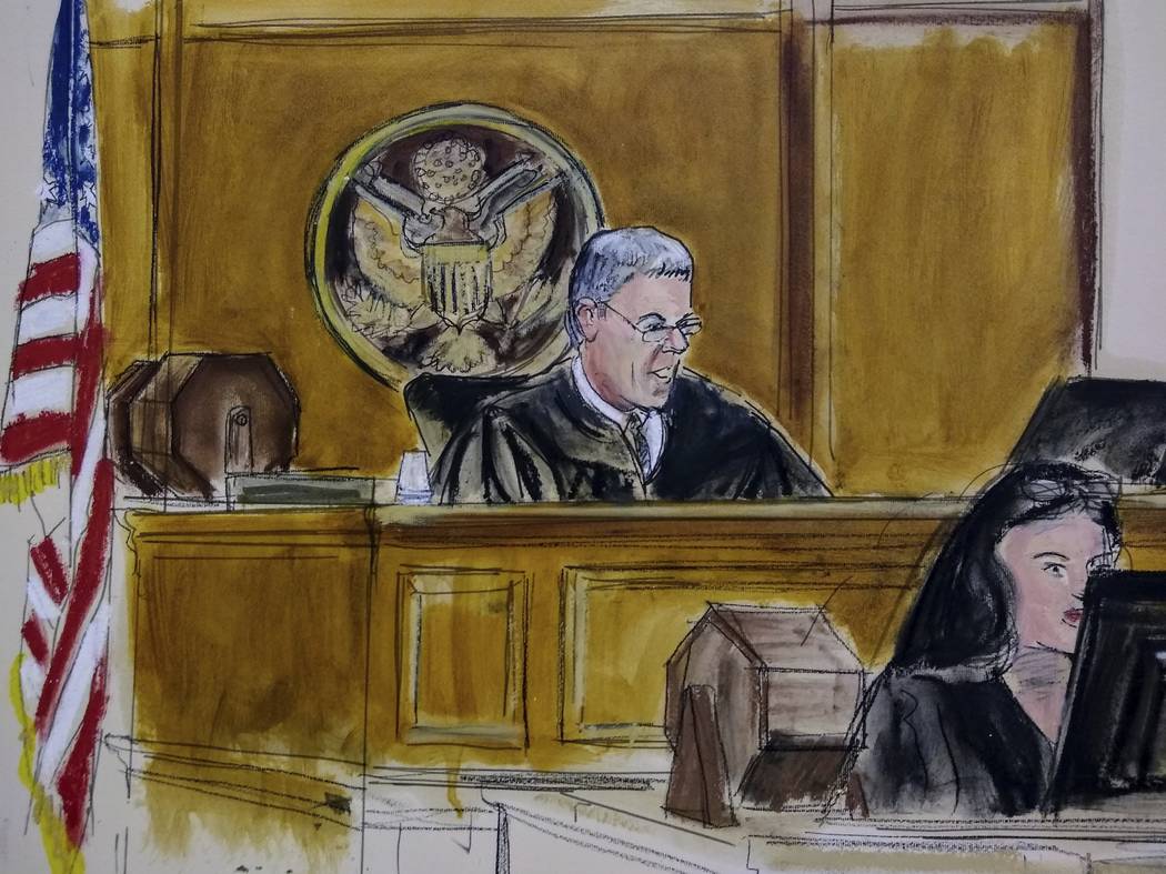 In this courtroom artist's sketch, Magistrate Judge Stewart Aaron sits at the bench during an i ...