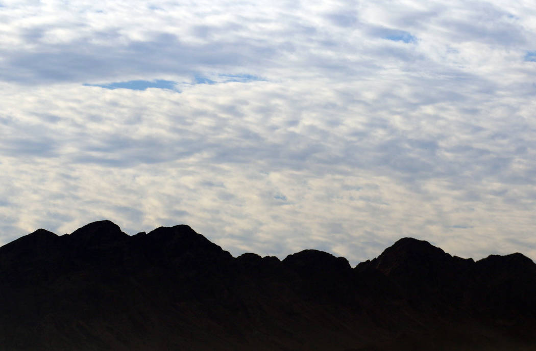 Cloudy skies linger in the Las Vegas Valley on Thursday, Oct. 17, 2019. Windy conditions are ex ...