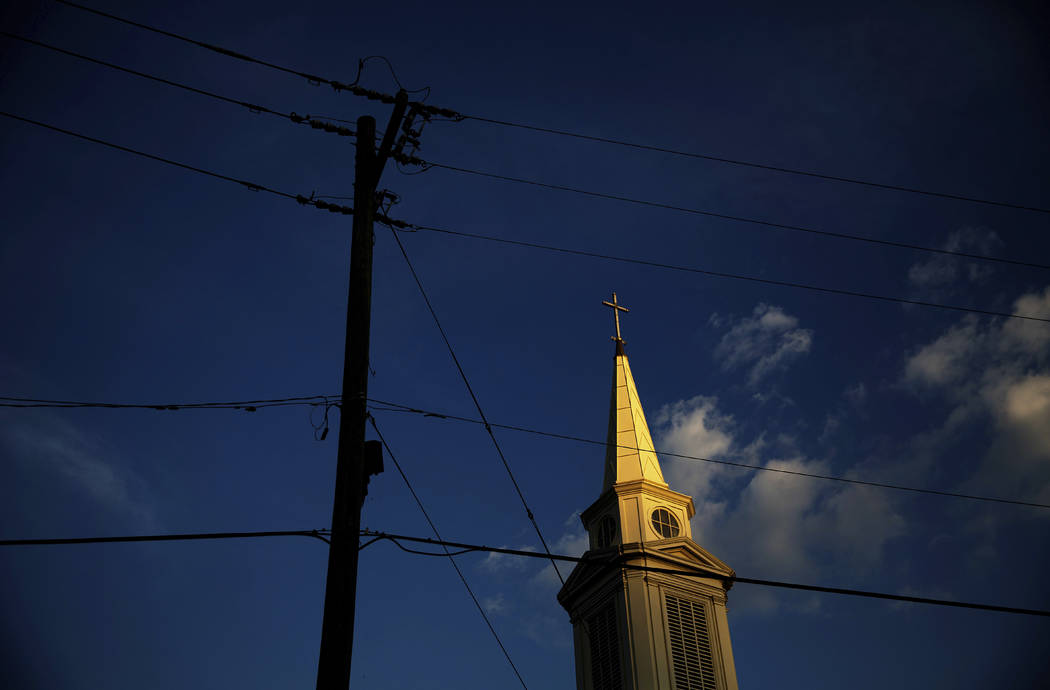 n a Tuesday, April 11, 2017, file photo, the sun sets on a Baptist church in Georgia. According ...