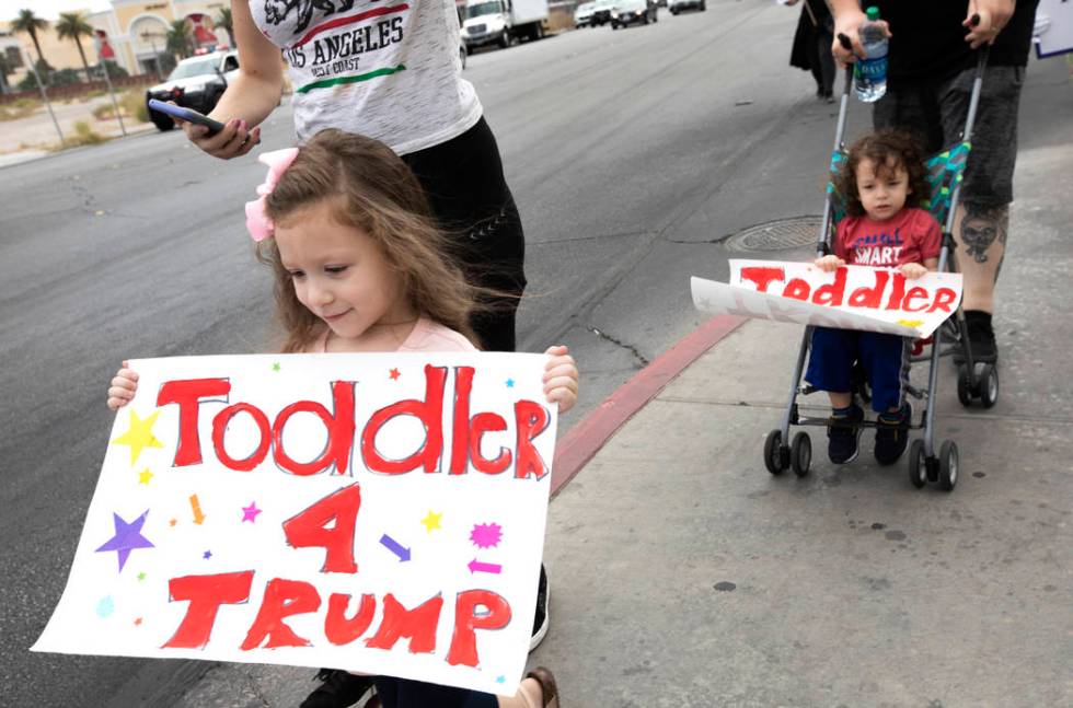 Lucy Biassotti, left, and Benny Biassotti came out to the March for Trump with their parents on ...