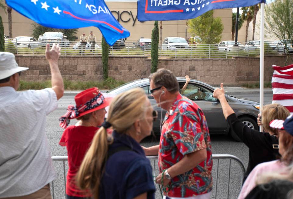 A vehicle waves at the March for Trump on Thursday, Oct. 17, 2019, in Las Vegas. (Ellen Schmidt ...