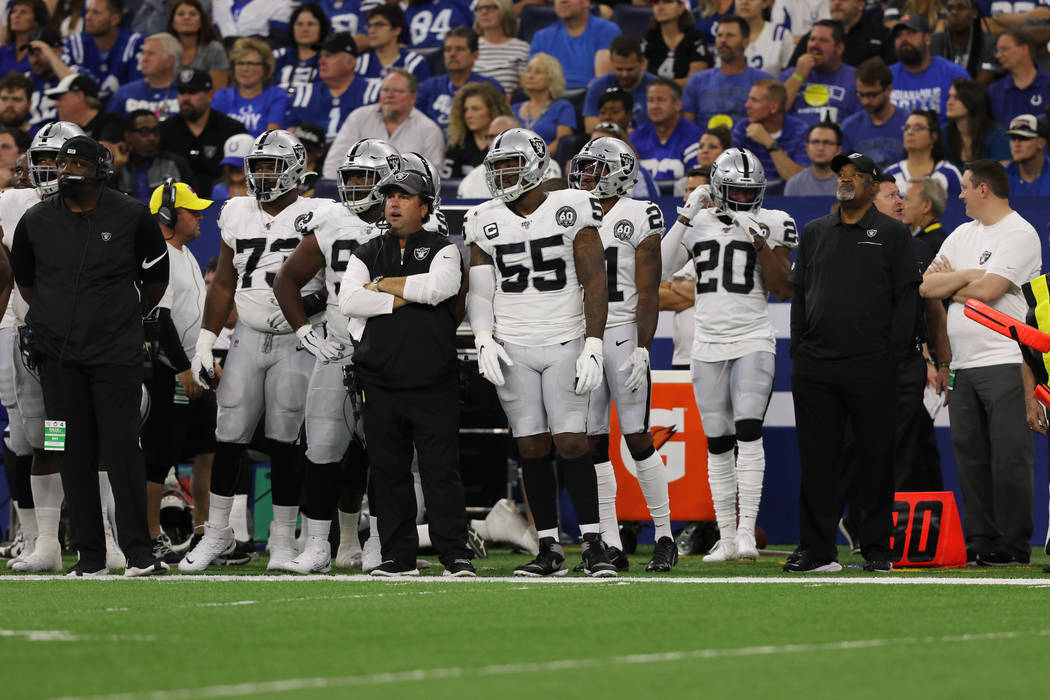 Oakland Raiders outside linebacker Vontaze Burfict (55) stands on the sideline to the right of ...