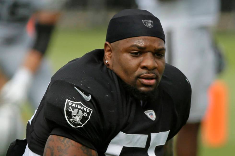 FILE - In this July 29, 2019, file photo, Oakland Raiders linebackers Vontaze Burfict gets up a ...