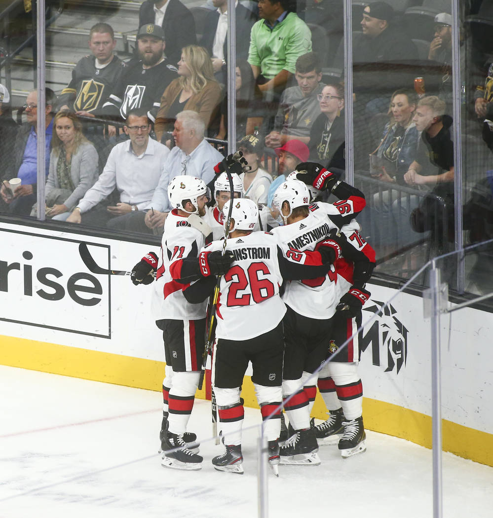 Ottawa Senators celebrate a goal against the Golden Knights during the first period of an NHL h ...