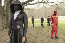 Regina King as Sister Night and Andrew Howard as Red Scare in "Watchmen." (Mark Hill/HBO)
