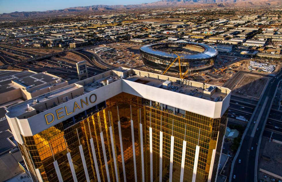 The Delano, near, and the Raiders Allegiant Stadium construction site, above, on Wednesday, Oct ...