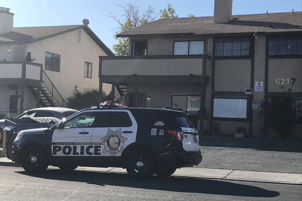 Las Vegas police investigate reports that a man threatened someone with a gun at an apartment c ...