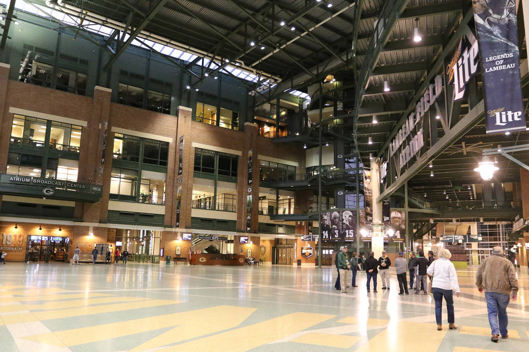 Guests explore the Lambeau Field Atrium concourse at Lambeau Field, home of the Green Bay Packe ...
