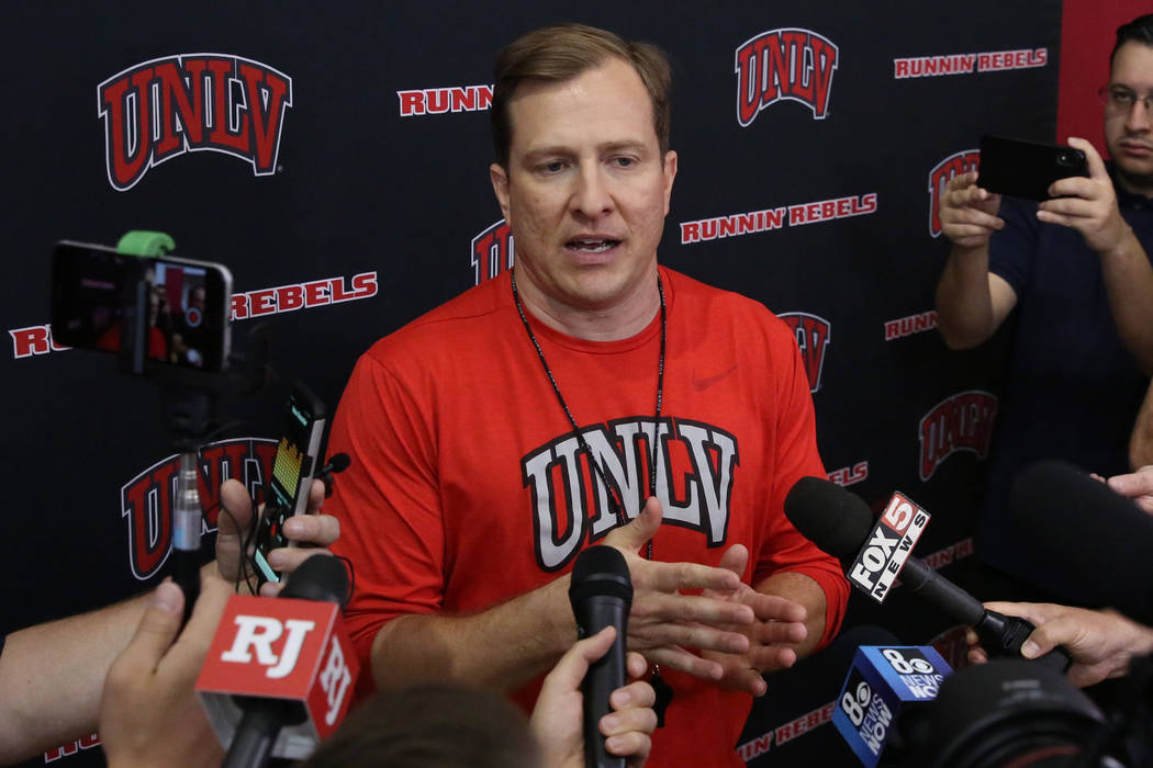 UNLV Rebels head coach T.J. Otzelberger talks to the media after team's first basketball practi ...