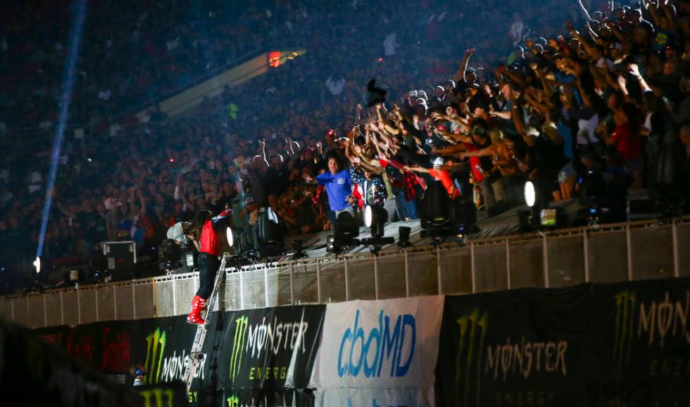 Malcolm Stewart, left, throws a jersey into the crowd after being introduced during the opening ...