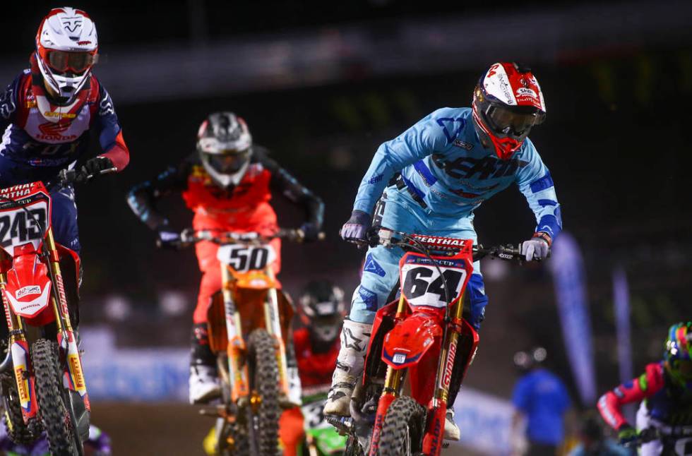 Tim Gajser (243), Benny Bloss (50) and Vince Friese (64) compete during the second round of the ...