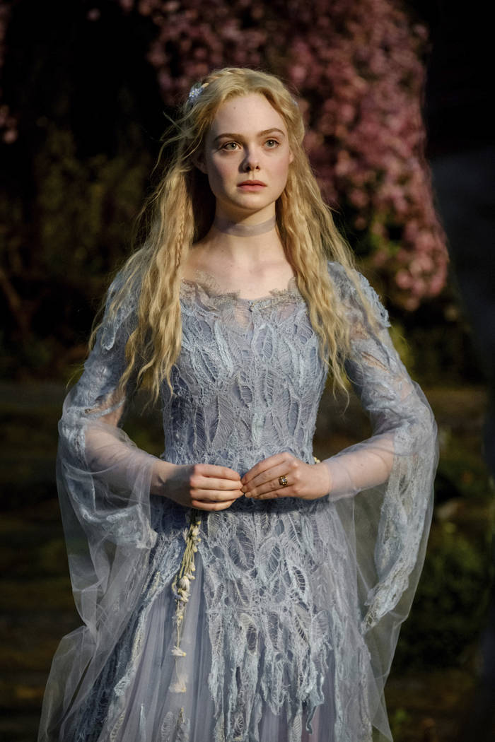 This image released by Disney shows Elle Fanning as Aurora in a scene from "Maleficent: Mi ...