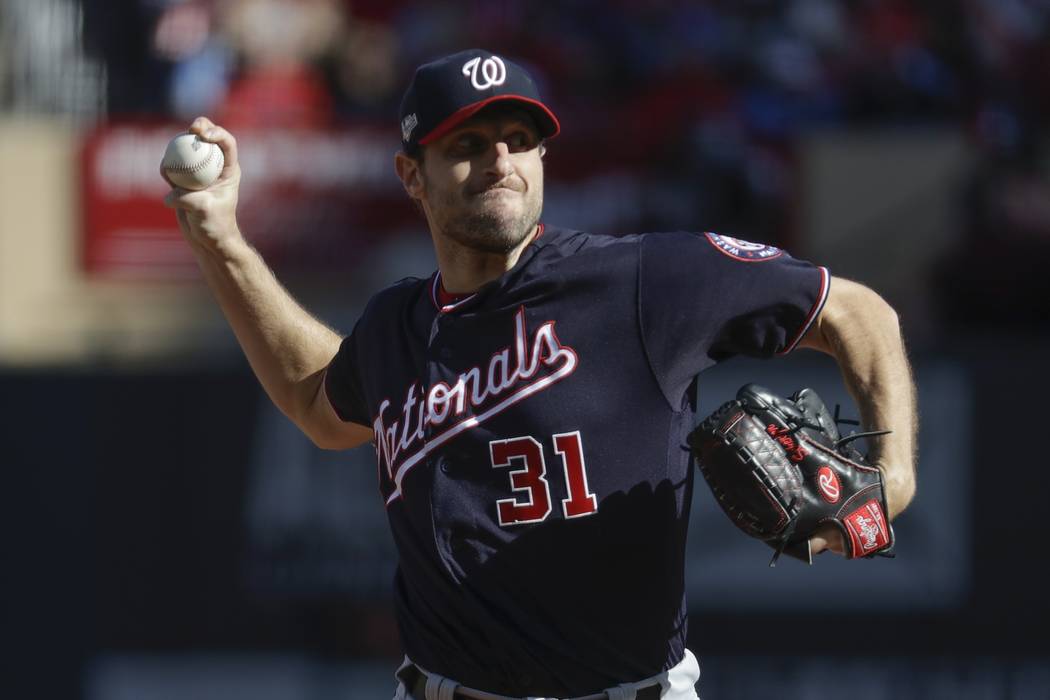 Washington Nationals starting pitcher Max Scherzer throws during the first inning of Game 2 of ...