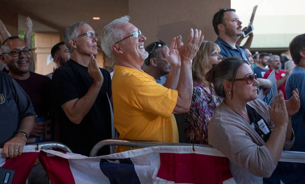 The crowd at a rally for presidential candidate Pete Buttigieg cheers as he discusses his healt ...