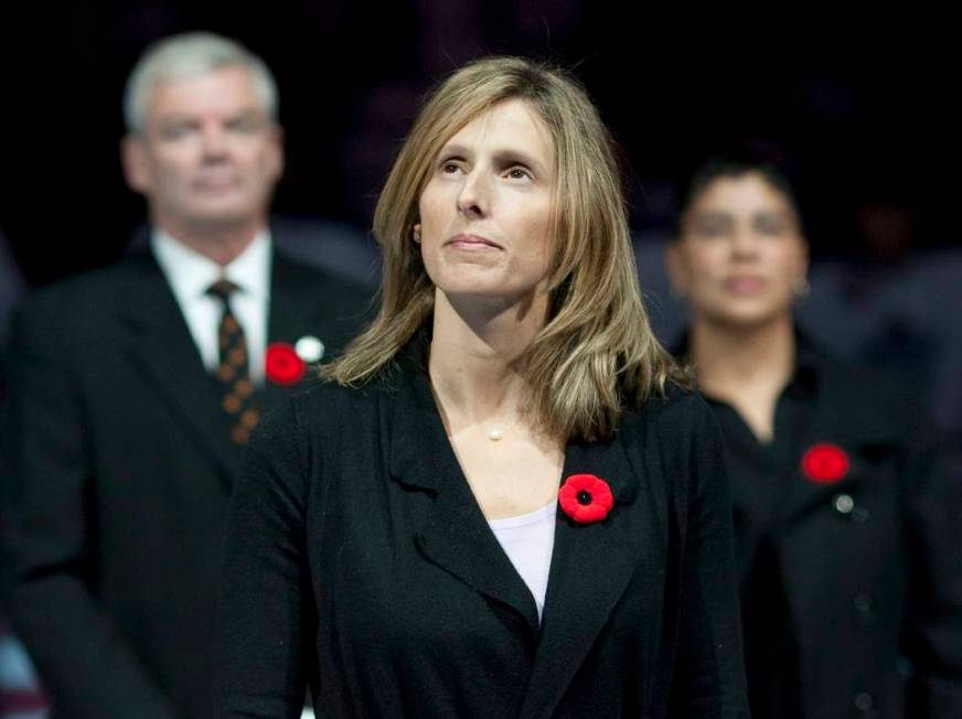 In this Nov. 6, 2010, file photo, Cammi Granato stands on center ice after being inducted into ...