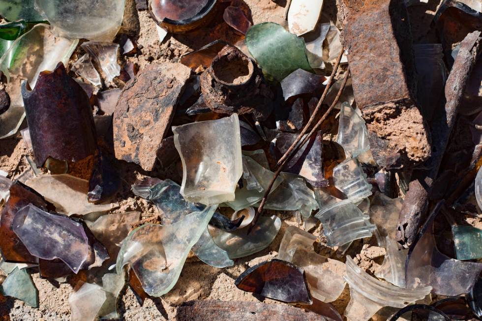 Cracked bottles and debris on the ground in St. Thomas, in the Lake Mead National Recreation Ar ...