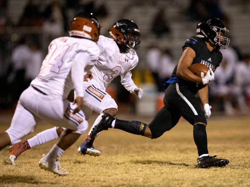 Desert Pines' Branden Thomas makes way toward the end zone against Legacy on Thursday, Oct. 24, ...