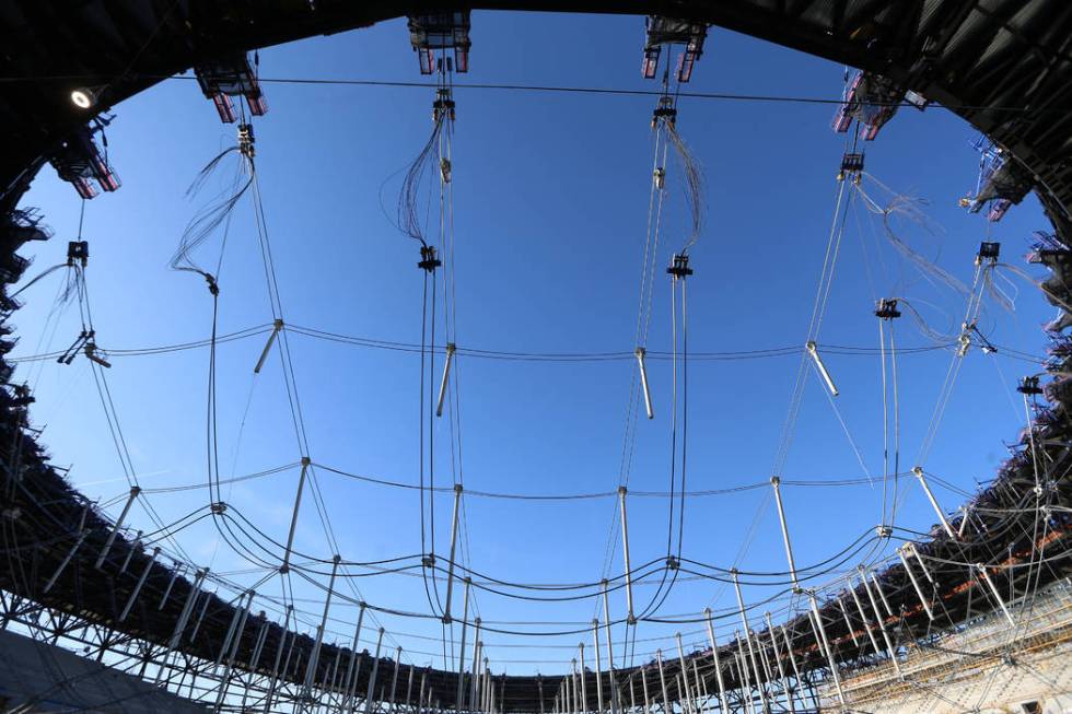 The cable net system that will support the roof at the Raiders Allegiant Stadium in Las Vegas, ...