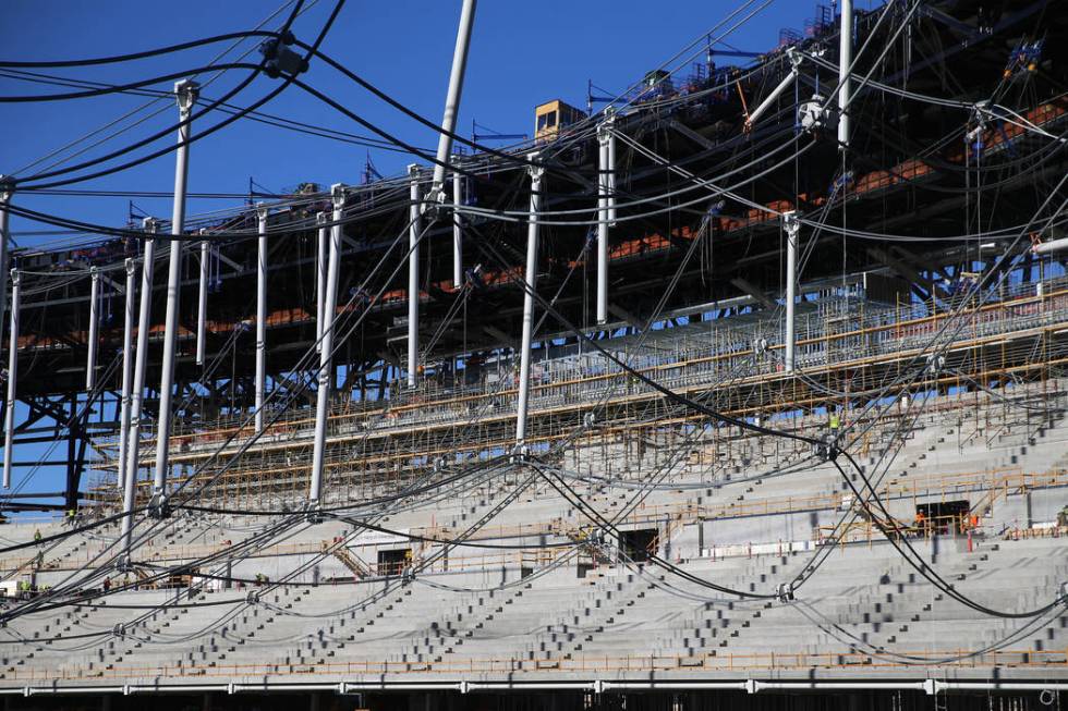 The cable net system that will support the roof at the Raiders Allegiant Stadium in Las Vegas, ...