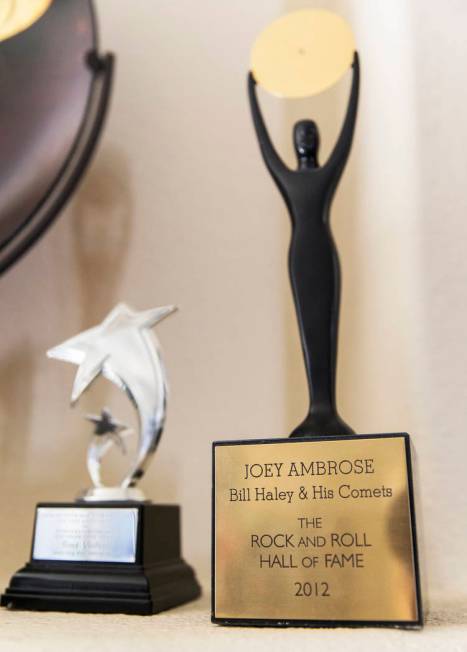 Joe D'Ambrosio's Rock & Roll Hall of Fame statue, right, at his home in Henderson on Friday ...